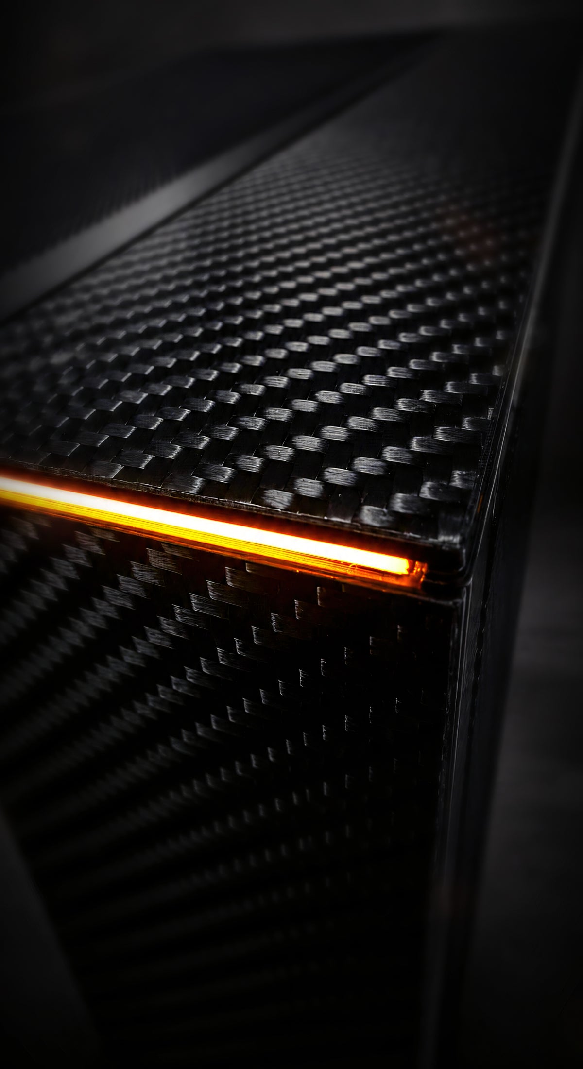 Close-up of the carbon fiber accents on the limited edition Lian Li O11D Lamborghini gaming PC case